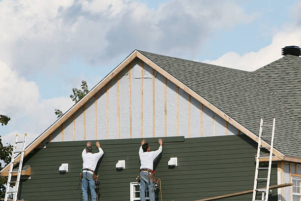 Professional Siding Repair technician working in Castalia, OH